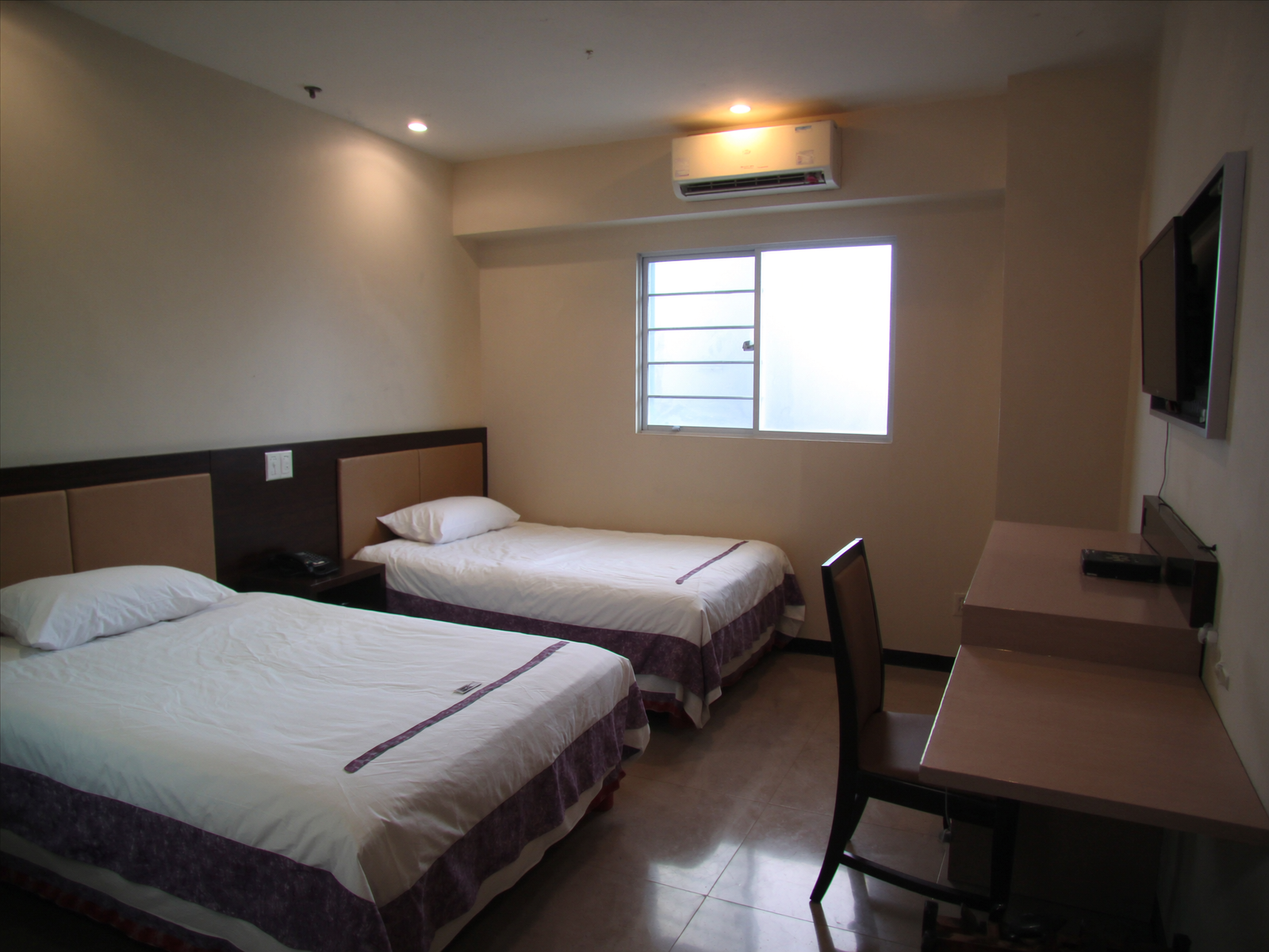 Super Deluxe Room with two single beds at OPS Guest House, Dhulagori, Sankrail, Howrah